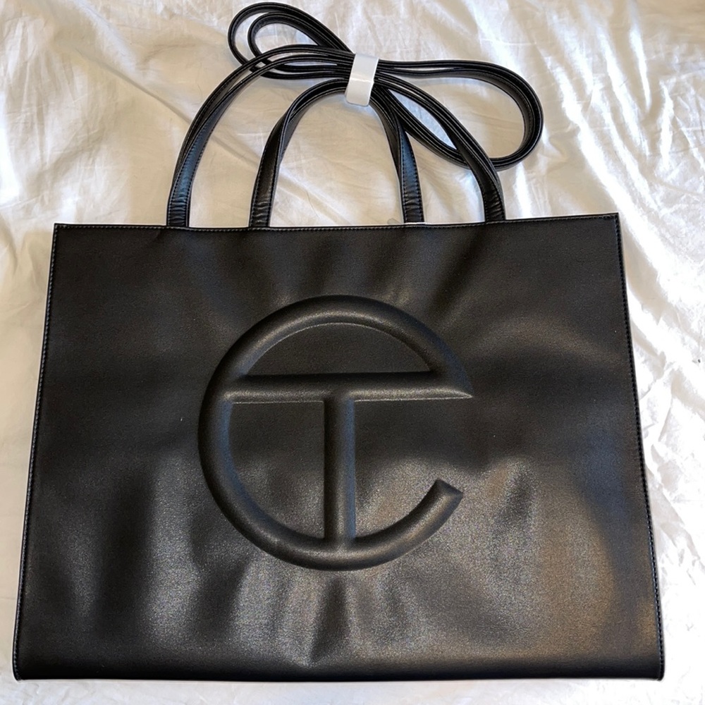 Large black Telfar shopping bag with dust bag